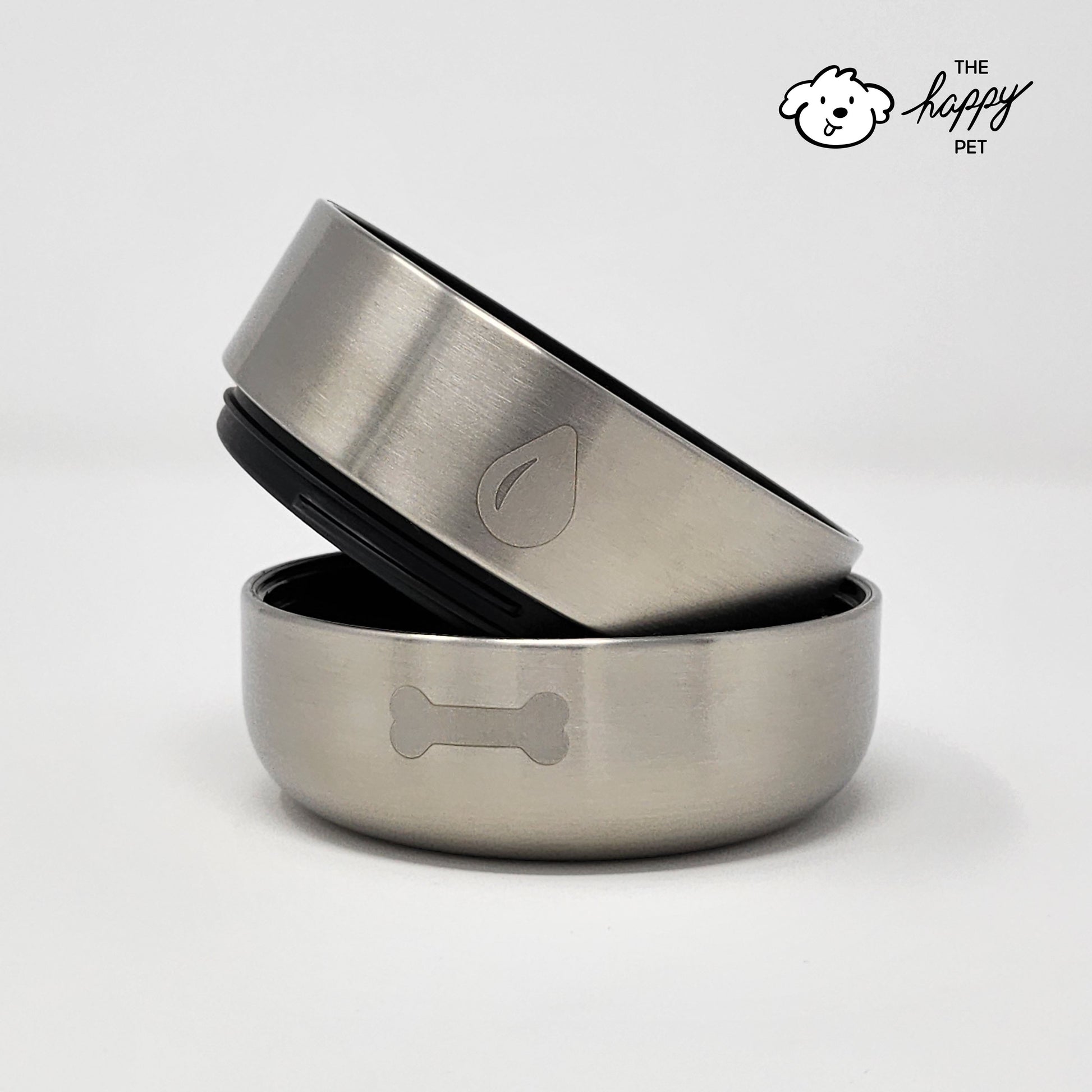 Two stainless steel dog bowls stacked on a white background with 'The Happy Pet' logo.
